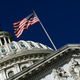 An American flag waves outside the Capitol building in Washington, D.C.
Win McNamee/Getty Images